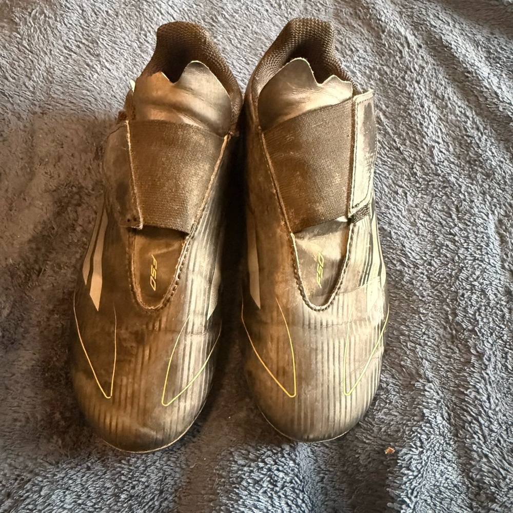 Boys Adidas F50 soccer cleats, black. Velcro/hook and loop closure, Sz 2